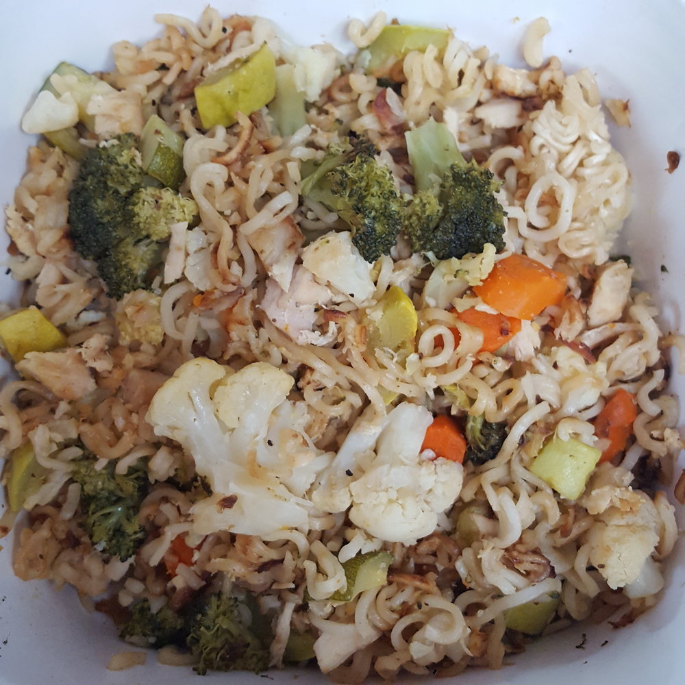 Easy ramen noodle stir fry with broccoli, zucchini, carrots, and chicken.